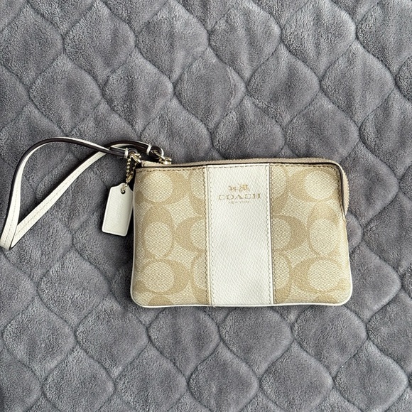 Coach Handbags - Coach Corner Zip Wristlet in Signature Coated Canvas